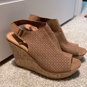 Tan laser cut detail wedge bootie with cork detail on heal